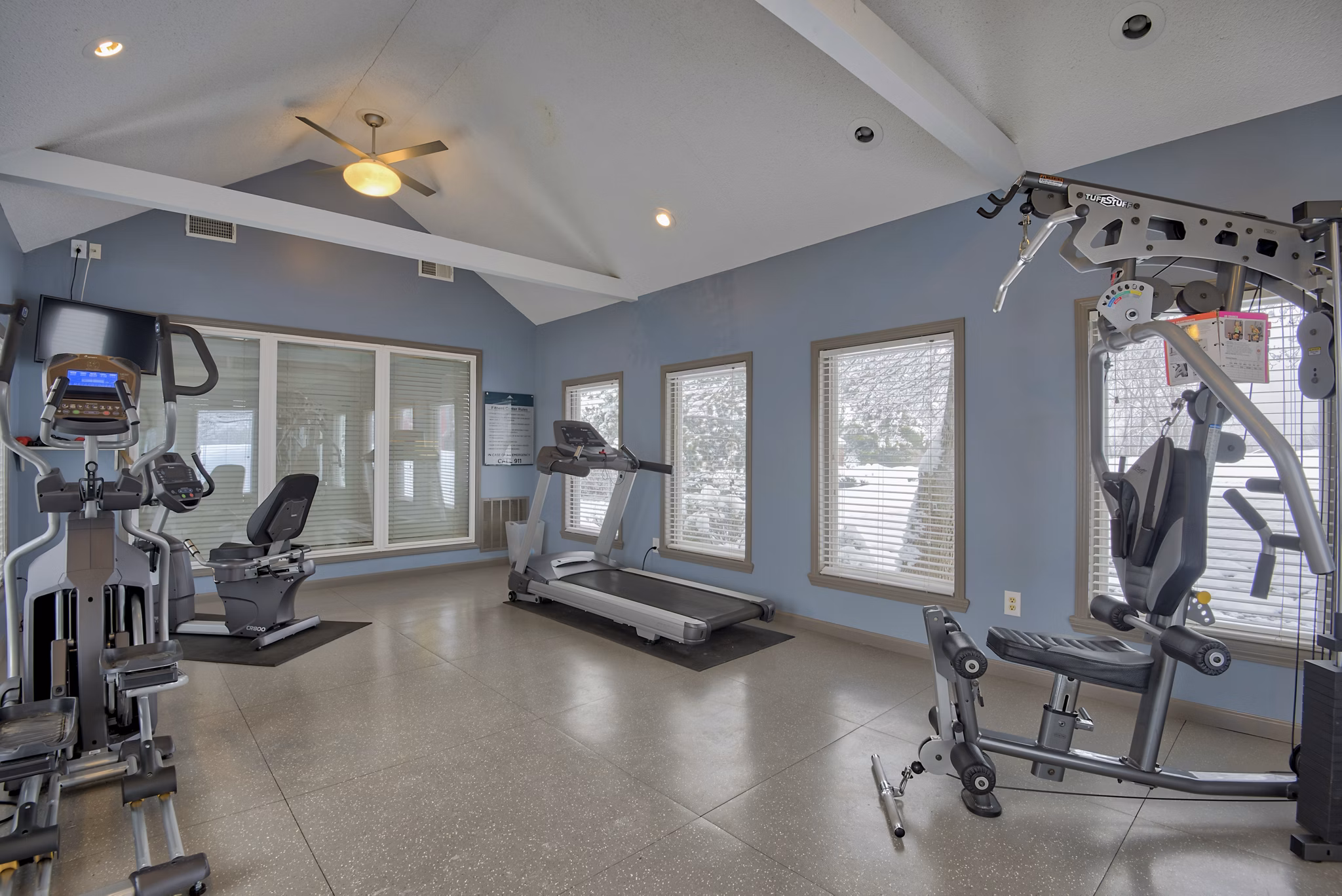 State-of-the-art fitness center with modern equipment at Pinehurst Apartments