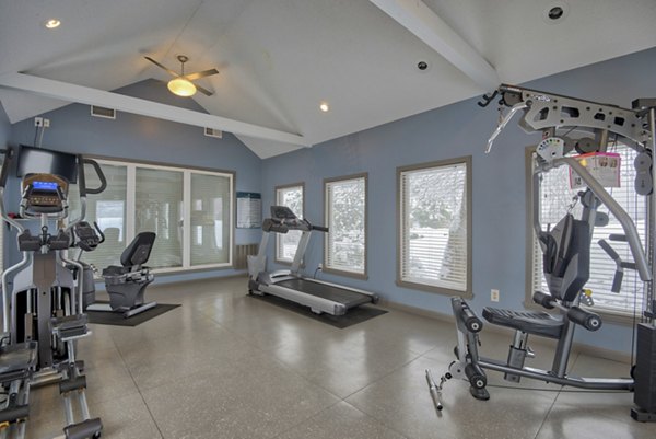 State-of-the-art fitness center with modern equipment at Pinehurst Apartments