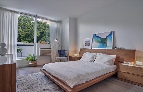 Modern bedroom with chic dÃ©cor in 7 Seventy House Apartments