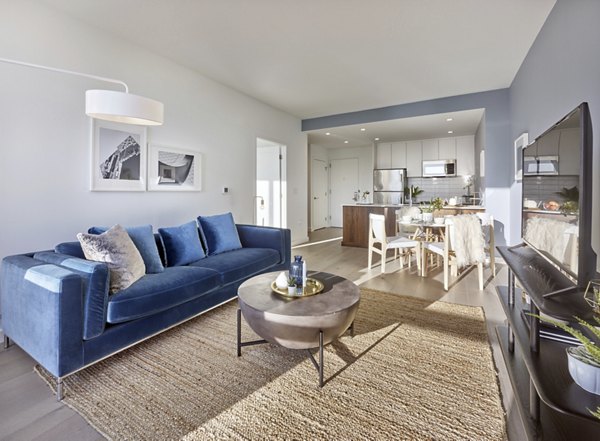 Spacious living room with modern decor at 7 Seventy House Apartments