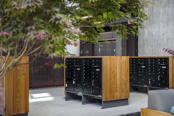 Modern mail room with secure parcel lockers at The Union Apartments