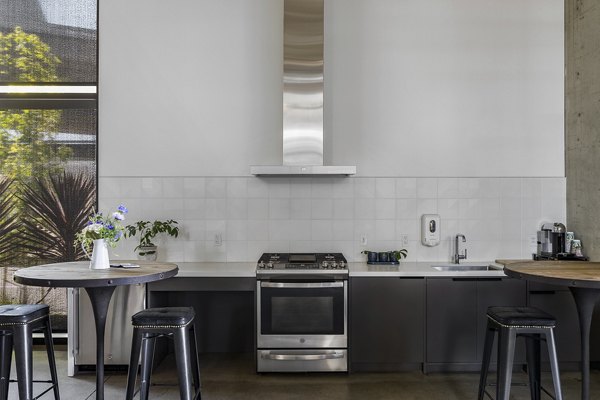 The Union Apartments: Modern clubhouse featuring stylish seating and lighting in downtown Seattle
