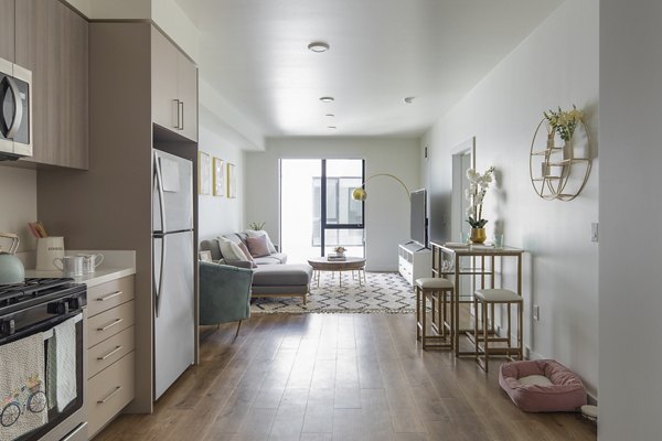 Spacious living area with modern decor in The Union Apartments, Greystar luxury property