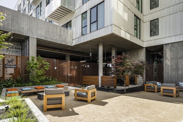 The Union Apartments: Serene courtyard featuring landscaped gardens and seating for relaxation in luxury community