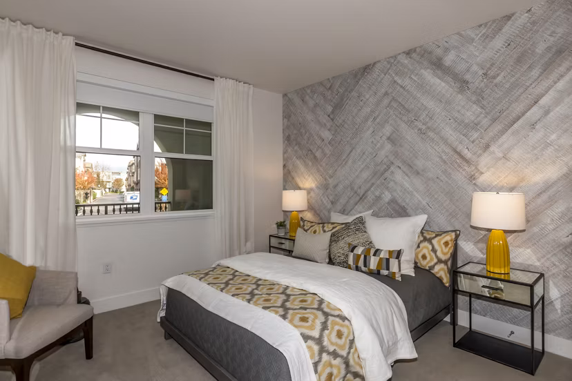 Cozy bedroom with modern decor in Encasa Apartments