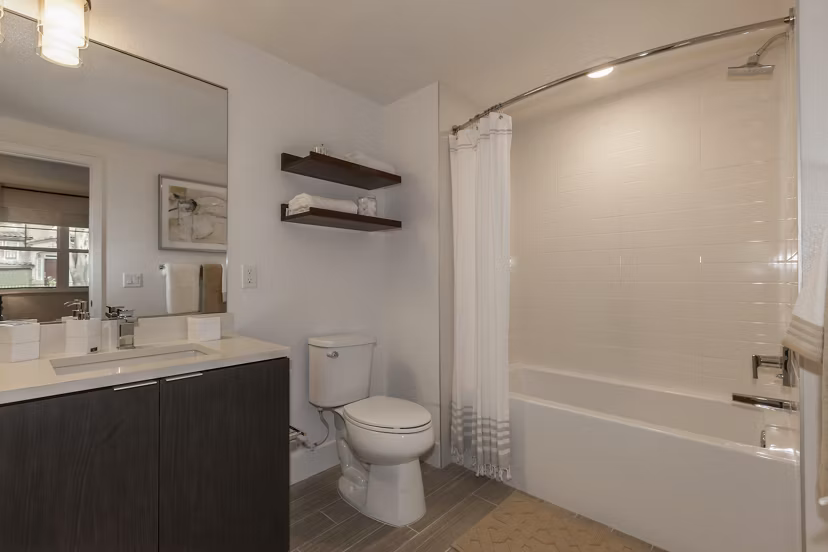 Modern bathroom with sleek fixtures at Encasa Apartments, luxury living by Greystar