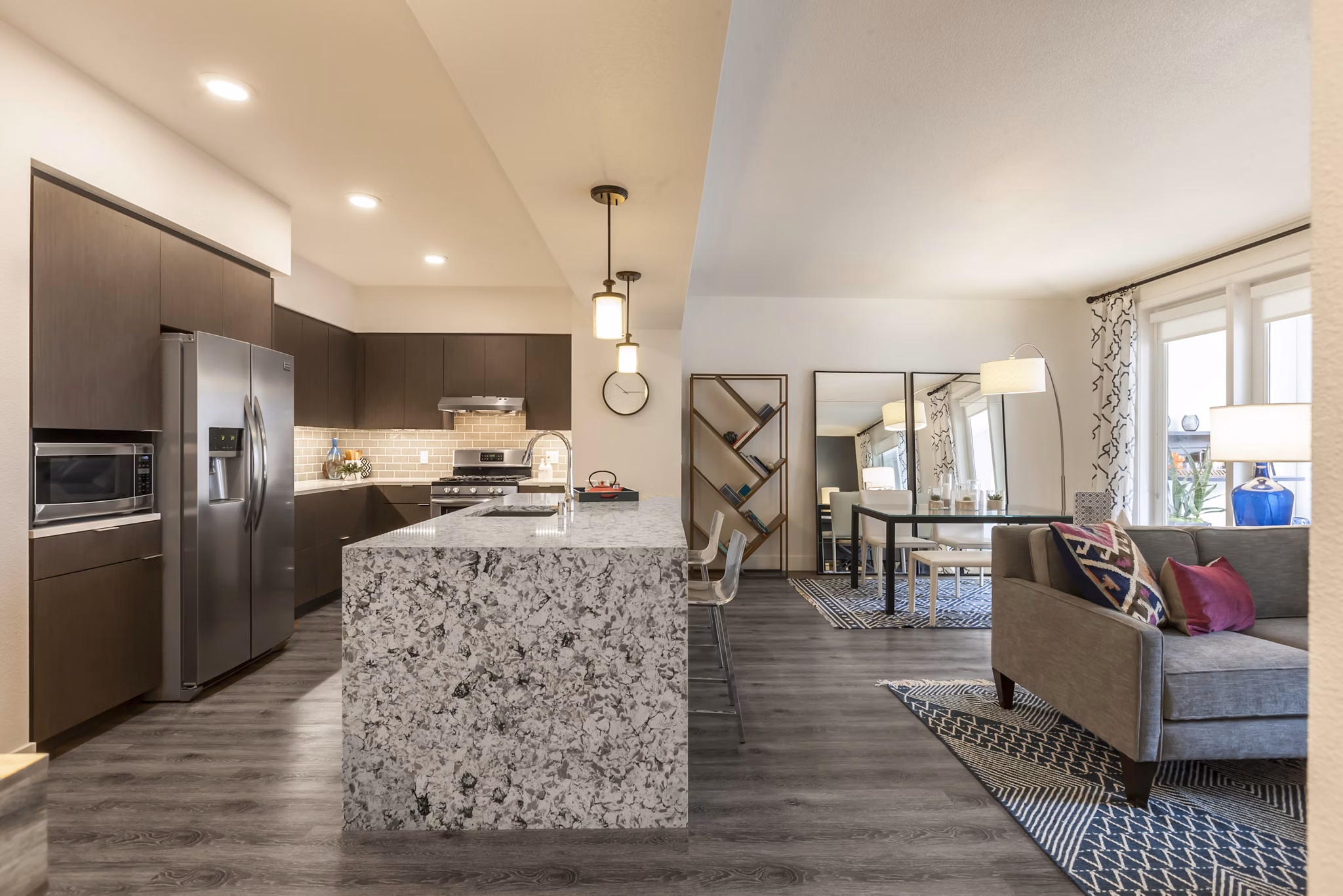 Cozy bedroom with modern decor at Encasa Apartments