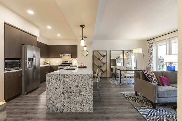 Cozy bedroom with modern decor at Encasa Apartments