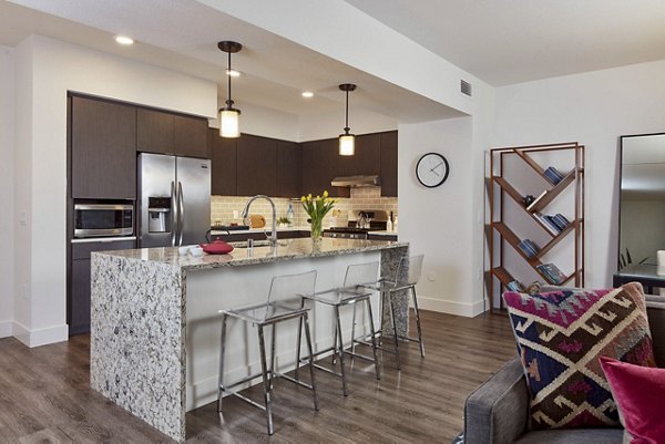 Spacious kitchen with modern appliances in Alliance Residential luxury apartments