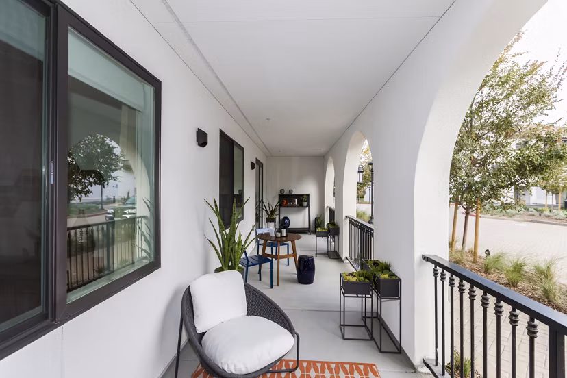 Chic patio area with modern seating at Encasa Apartments, a Greystar luxury apartment community