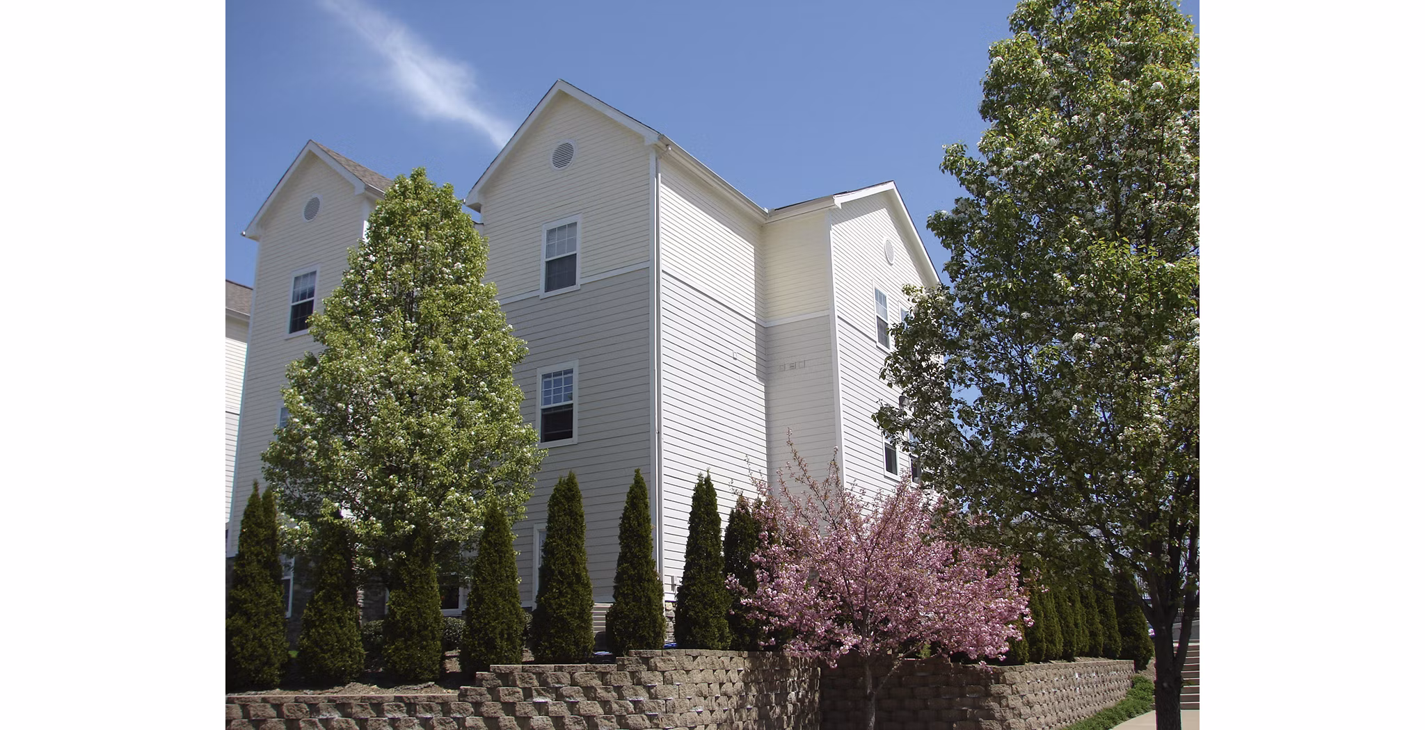 Vulcan Village: Elegant mid-rise apartment building with modern design in the heart of the city
