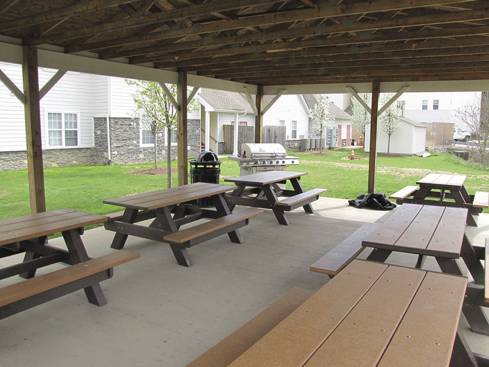 Outdoor recreation area with sports courts at Vulcan Village luxury apartments