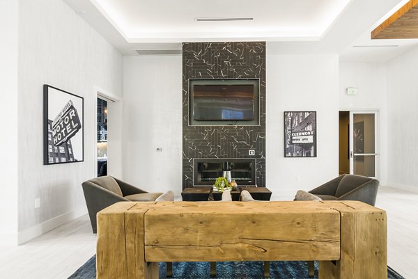 Clubhouse with modern seating and decor at Piedmont House Apartments in luxury Greystar community