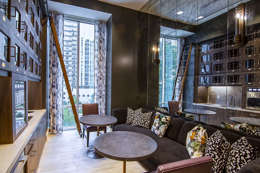 Clubhouse featuring modern design and comfortable seating at Piedmont House Apartments