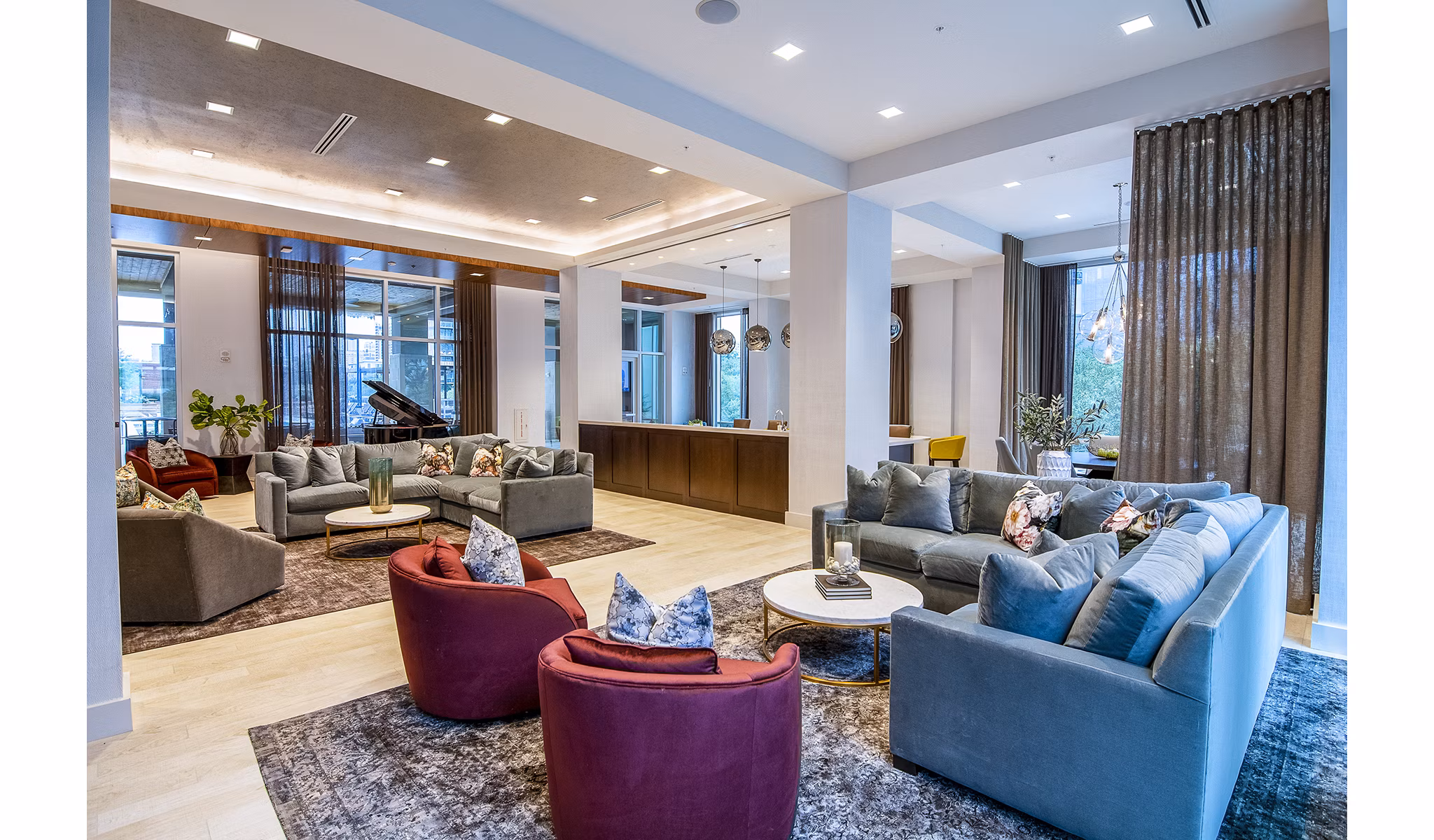 Clubhouse featuring modern design and cozy seating at Piedmont House Apartments in Atlanta
