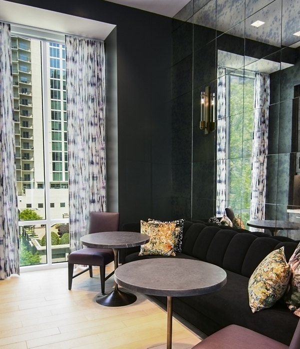 Clubhouse featuring modern design and stylish furnishings at Piedmont House Apartments in vibrant Atlanta neighborhood