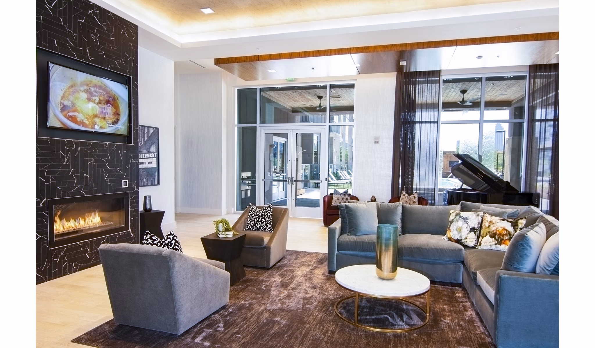 Elegant clubhouse with modern design at Piedmont House Apartments featuring spacious seating and community spaces
