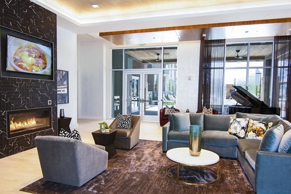 Elegant clubhouse with modern design at Piedmont House Apartments featuring spacious seating and community spaces