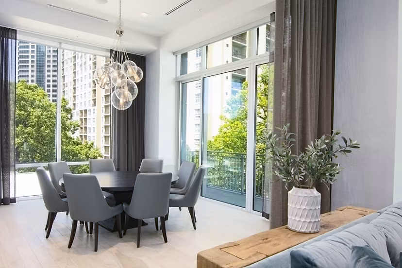 Clubhouse featuring modern lounge seating and entertainment areas at Piedmont House Apartments in Atlanta