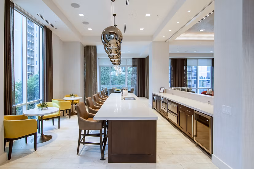 Elegant clubhouse with modern decor at Piedmont House Apartments offering a luxurious setting for community gatherings