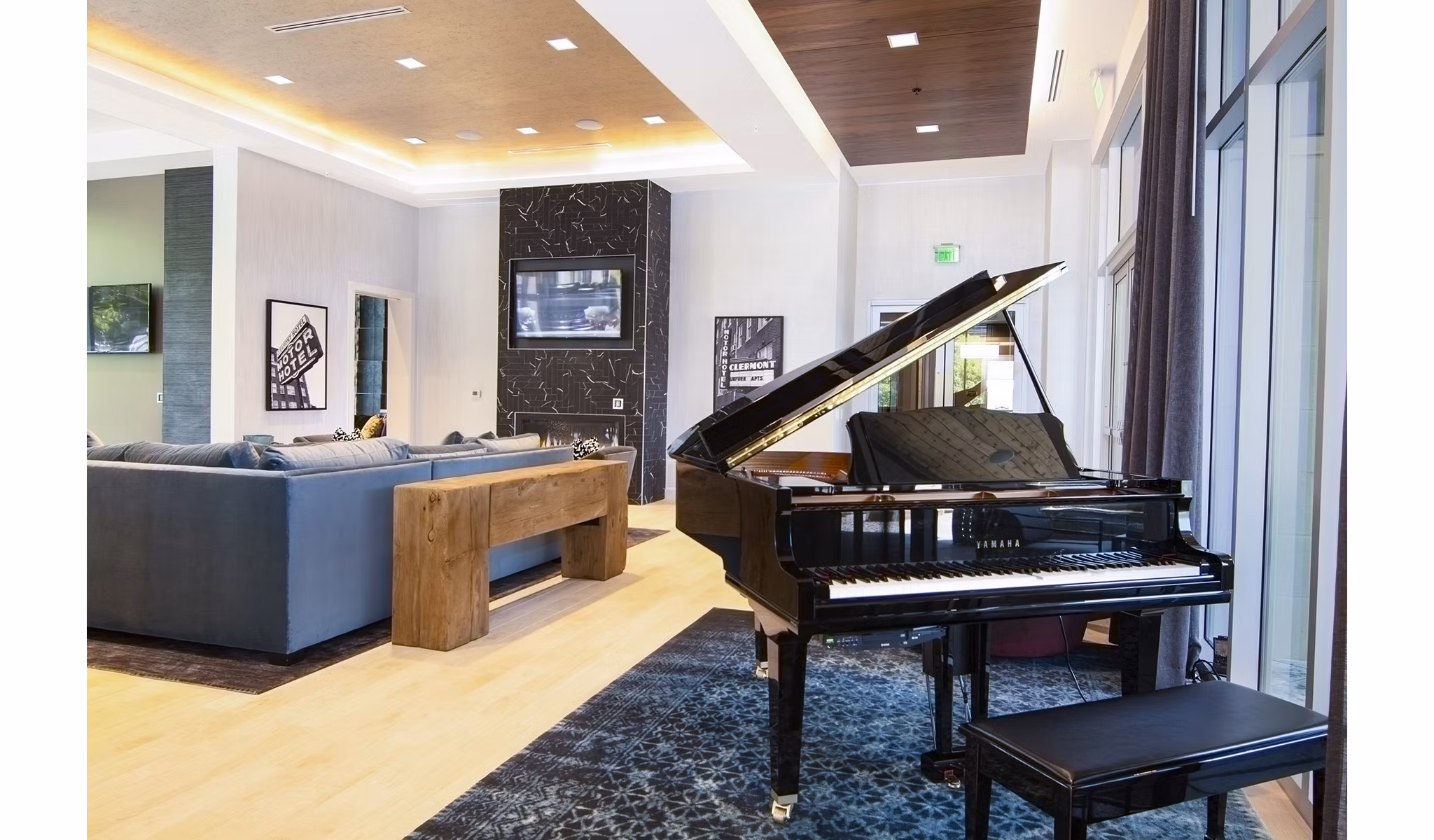 Clubhouse featuring modern decor and seating at Piedmont House Apartments, a luxury community by Greystar in a vibrant location