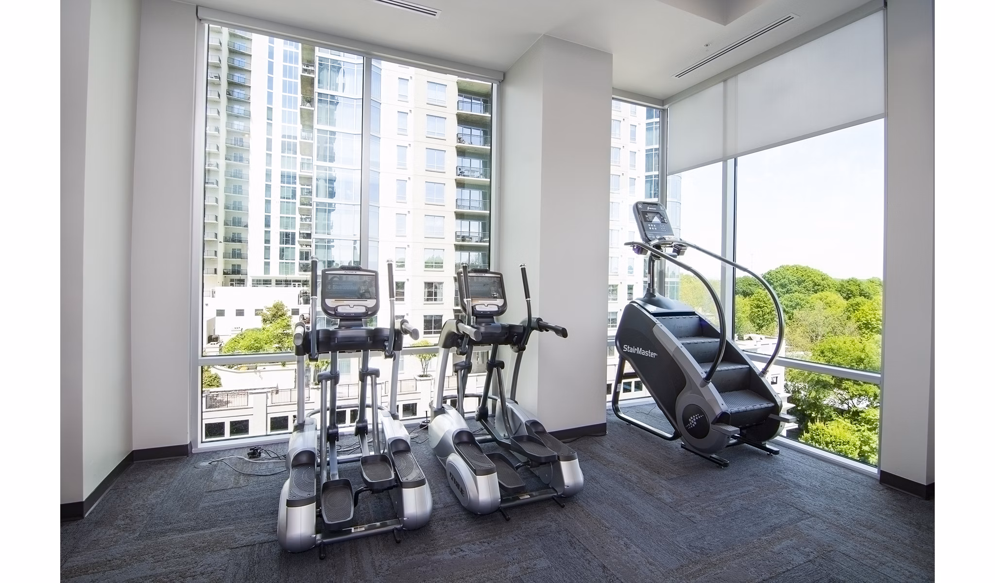 Modern fitness center with top-tier equipment at Piedmont House Apartments