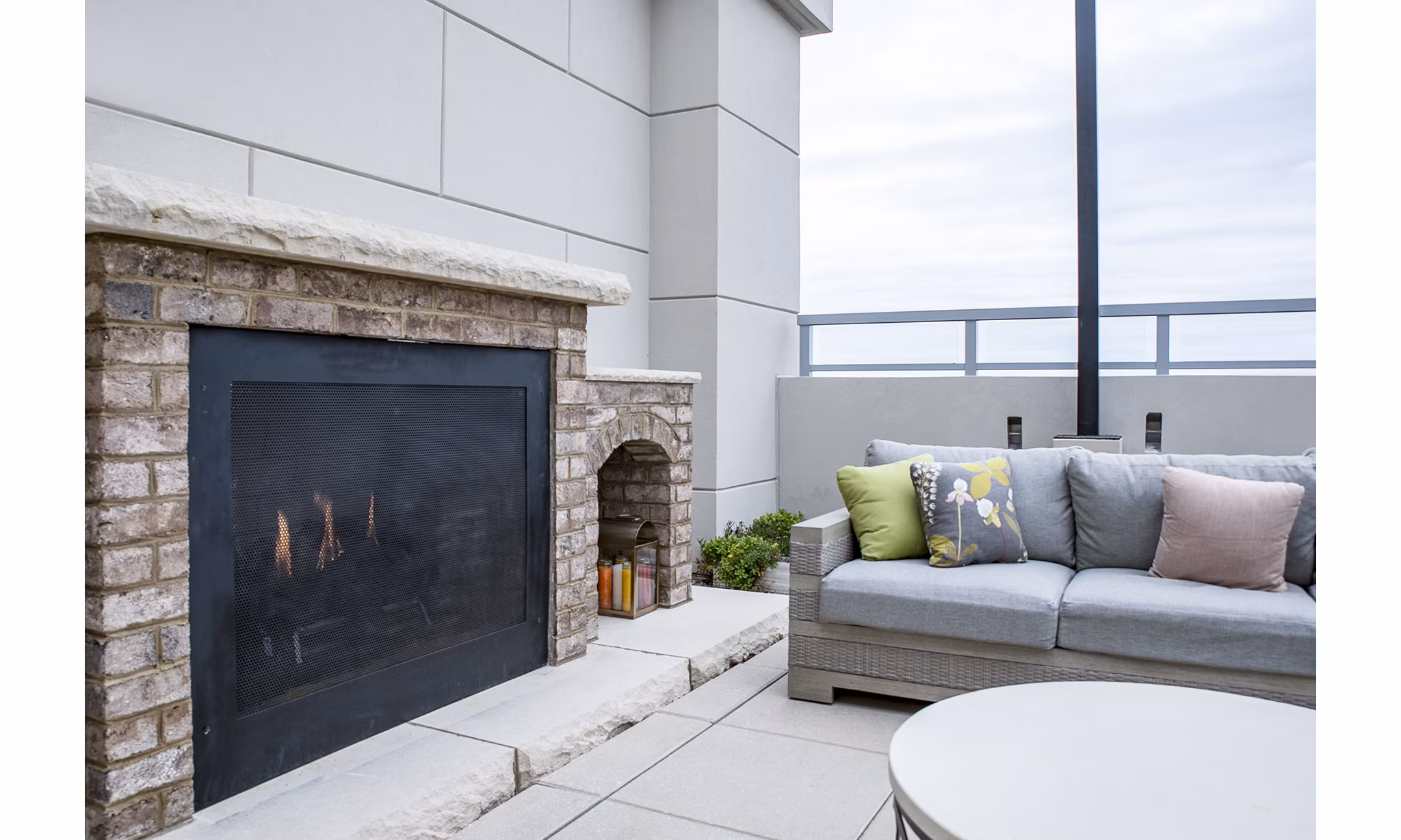 Rooftop lounge with fire pit at Piedmont House Apartments offering luxury living spaces