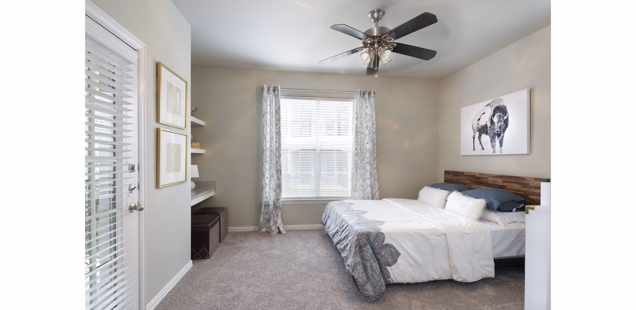 Cozy bedroom with modern decor at Grapevine TwentyFour 99 Apartments
