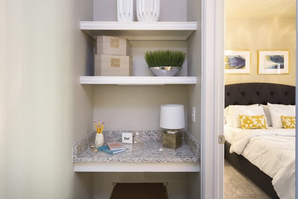 Cozy bedroom featuring modern decor at Grapevine TwentyFour 99 Apartments