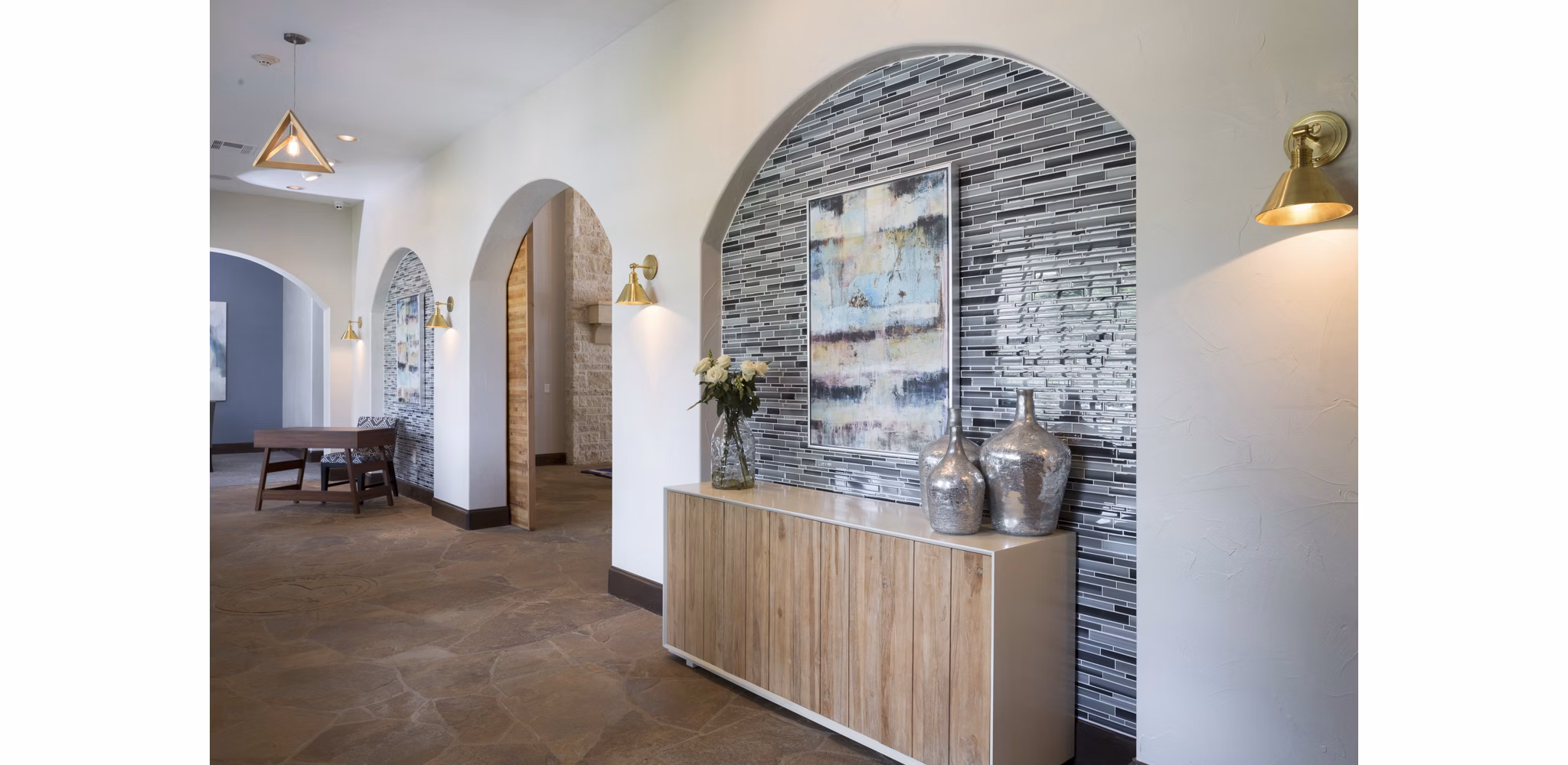 Clubhouse featuring contemporary design and cozy seating areas at Grapevine TwentyFour 99 Apartments