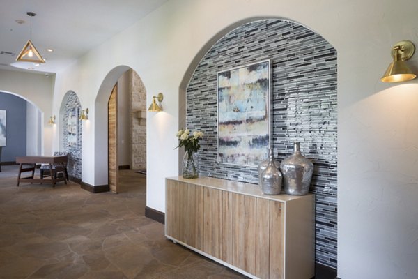 Clubhouse featuring contemporary design and cozy seating areas at Grapevine TwentyFour 99 Apartments