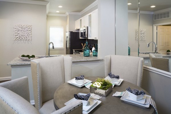 Dining room with elegant decor and modern furnishings at Grapevine TwentyFour 99 Apartments