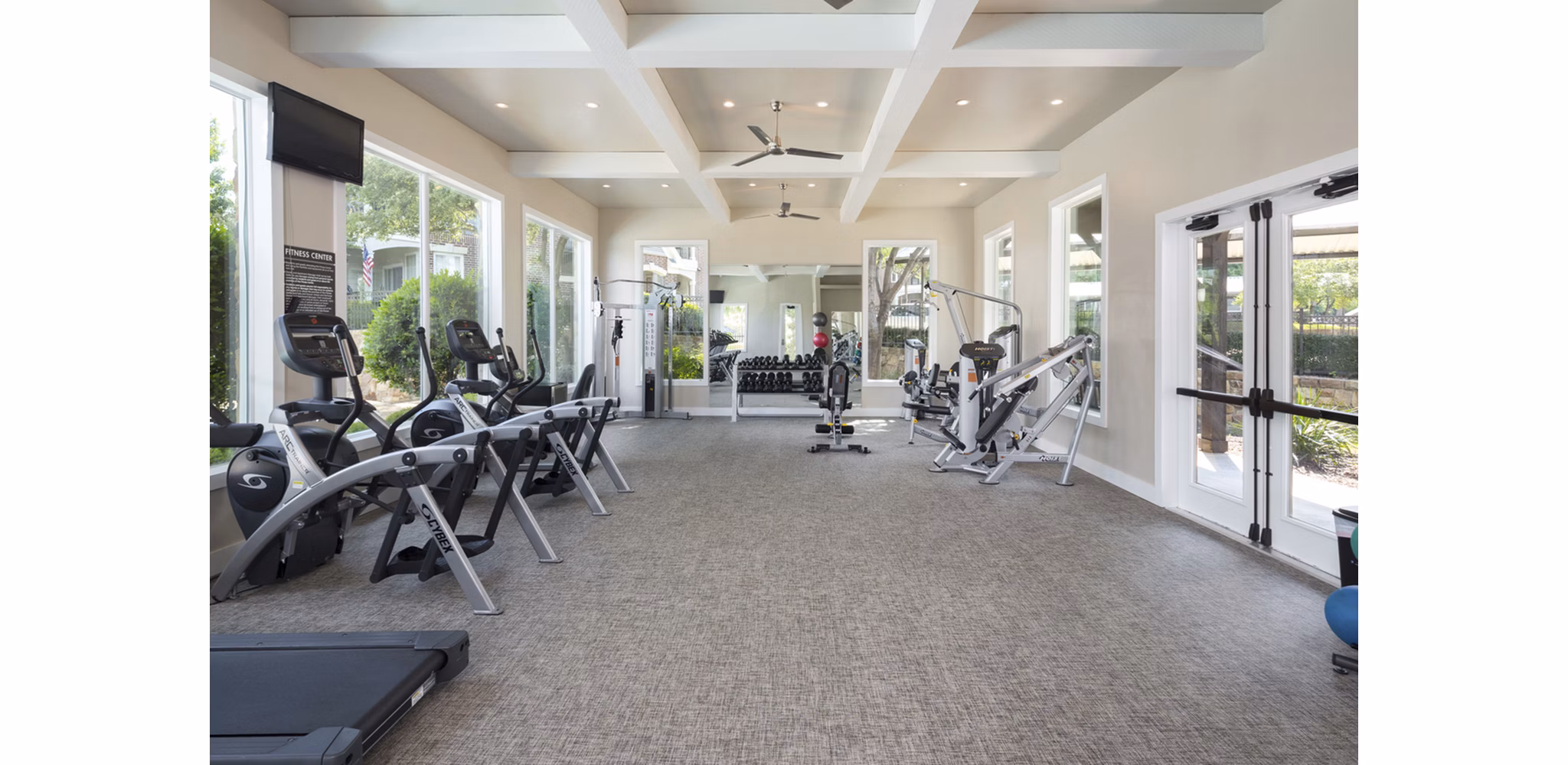 State-of-the-art fitness center with modern equipment at Grapevine TwentyFour 99 Apartments