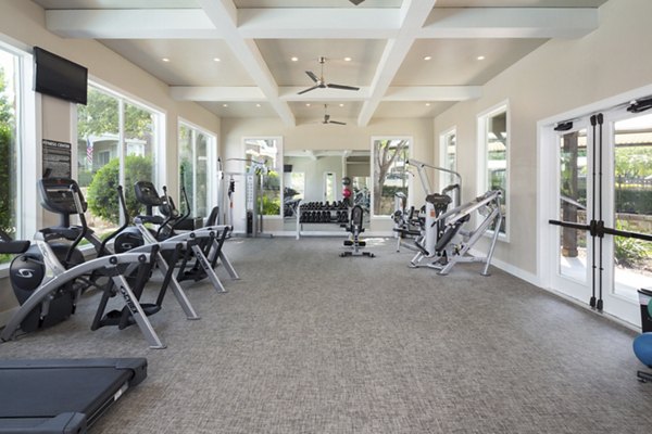 State-of-the-art fitness center with modern equipment at Grapevine TwentyFour 99 Apartments
