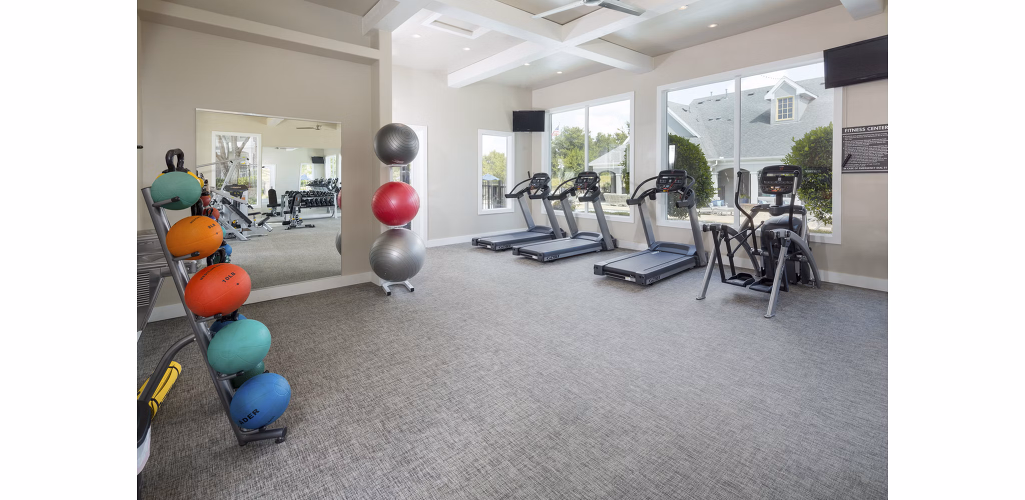 State-of-the-art fitness center with modern equipment at Grapevine TwentyFour 99 Apartments