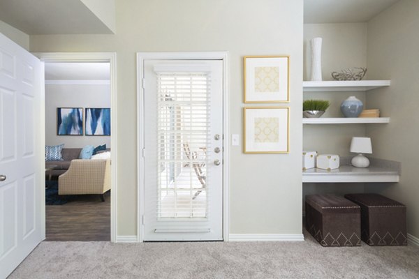 Contemporary hallway with sleek finishes at Grapevine TwentyFour 99 Apartments, offering luxury living spaces for comfort and style