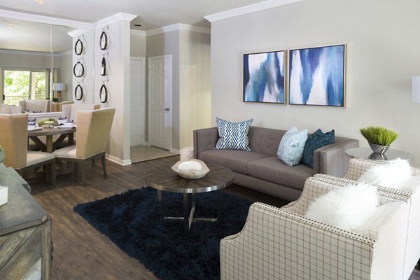 Spacious living room with modern decor in Grapevine TwentyFour 99 Apartments