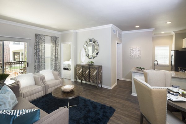 Spacious living room with modern decor in Grapevine TwentyFour 99 Apartments
