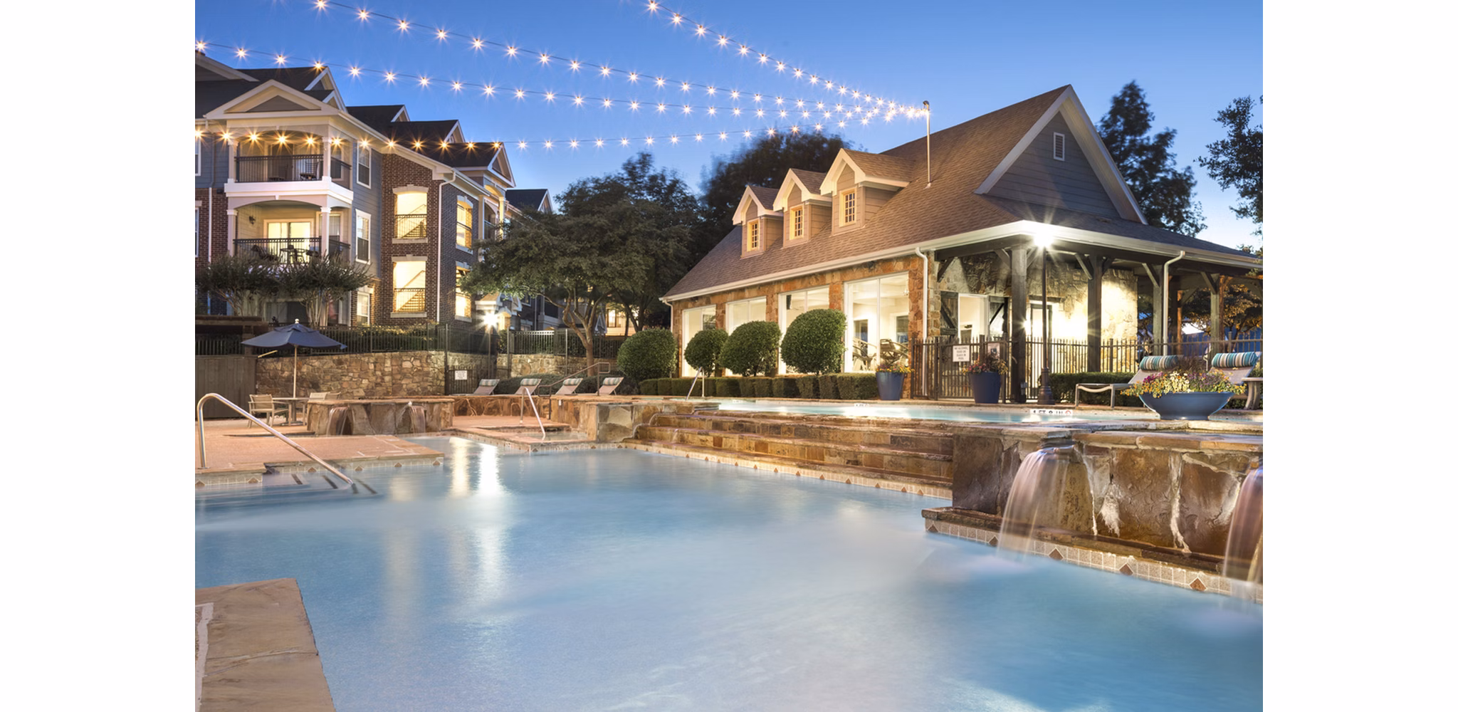 Resort-style pool area at Grapevine TwentyFour 99 Apartments offering luxury relaxation and leisure amenities