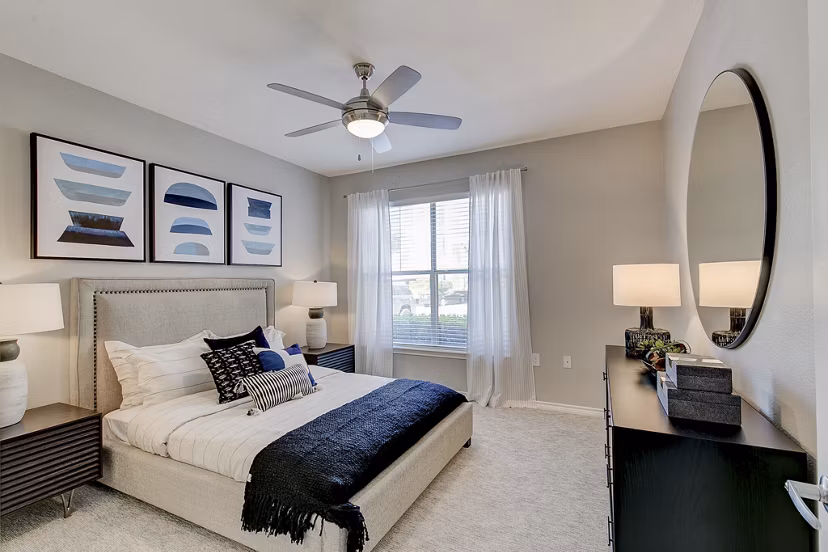 Spacious bedroom with modern decor at Eleven11 Lexington at Flower Mound Apartments