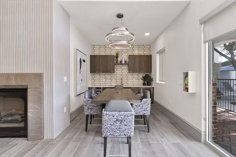 Meeting room with modern decor and conferencing equipment at Eleven11 Lexington at Flower Mound Apartments
