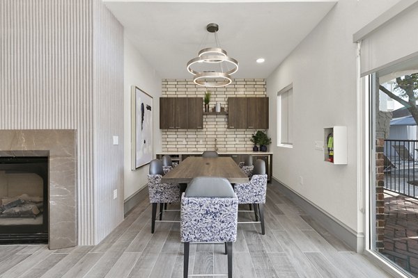 Meeting room with modern decor and conferencing equipment at Eleven11 Lexington at Flower Mound Apartments