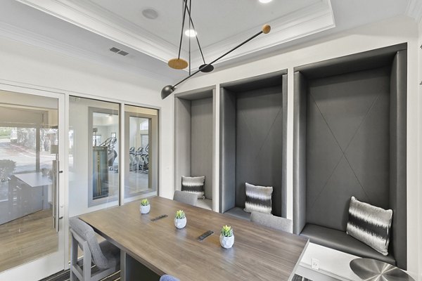 Meeting facility featuring modern decor at Eleven11 Lexington at Flower Mound Apartments Spacious layout suitable for conferences and events