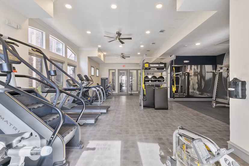 State-of-the-art fitness center with modern exercise equipment at Eleven11 Lexington at Flower Mound Apartments