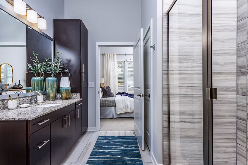 Bathroom with sleek fixtures and modern design at Everleigh Short Pump Apartments