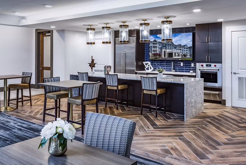 Clubhouse kitchen with modern appliances at Everleigh Short Pump Apartments, offering luxury living and community spaces
