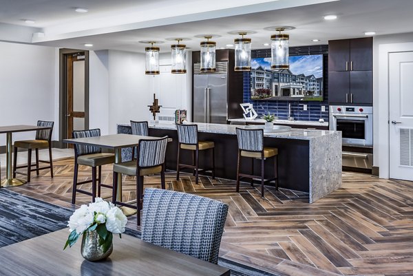 Clubhouse kitchen with modern appliances at Everleigh Short Pump Apartments, offering luxury living and community spaces