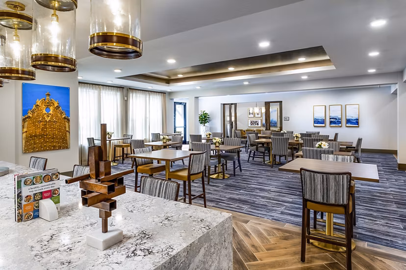 Elegant clubhouse with modern decor at Everleigh Short Pump Apartments, perfect for resident gatherings and events