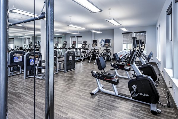 State-of-the-art fitness center with modern equipment at Everleigh Short Pump Apartments Perfect for an active lifestyle in luxury living