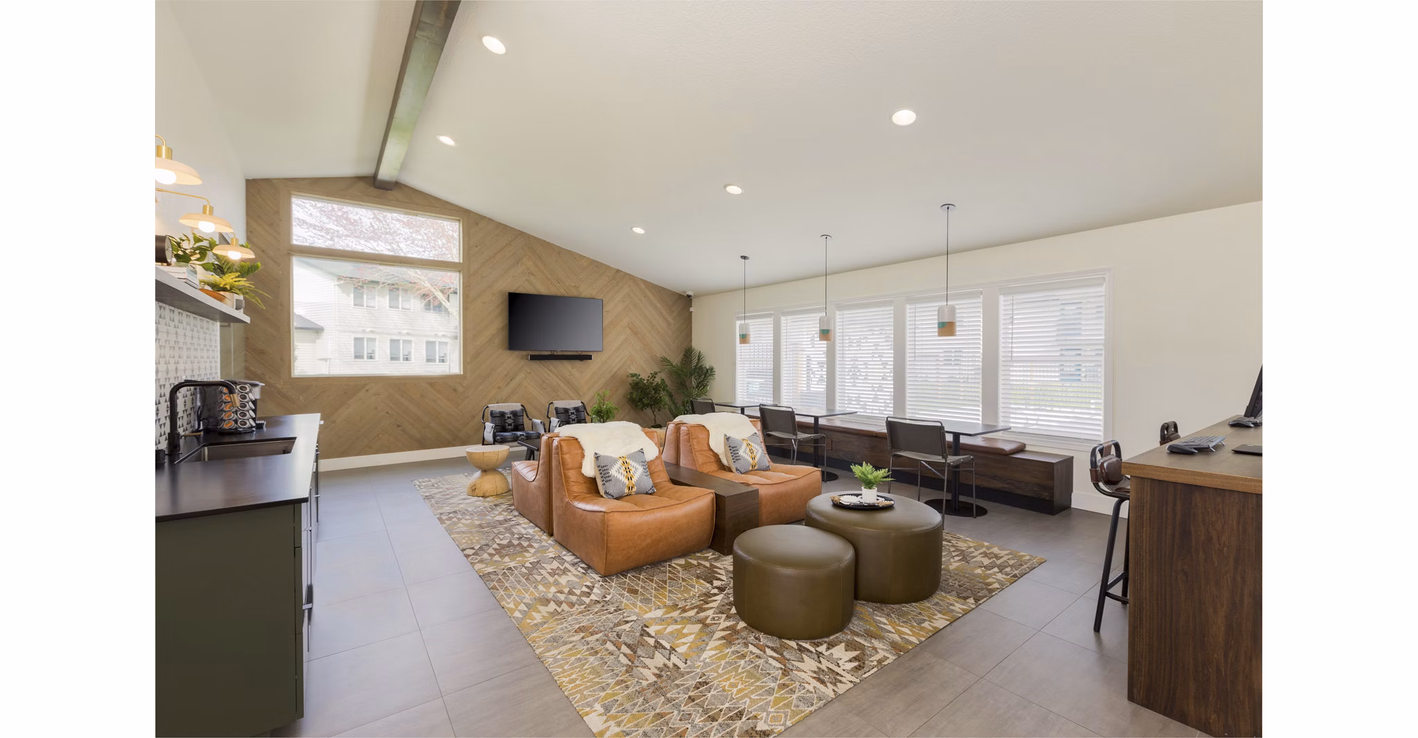Clubhouse at Cedar House Apartments featuring luxury amenities including a lounge area and game room in vibrant community
